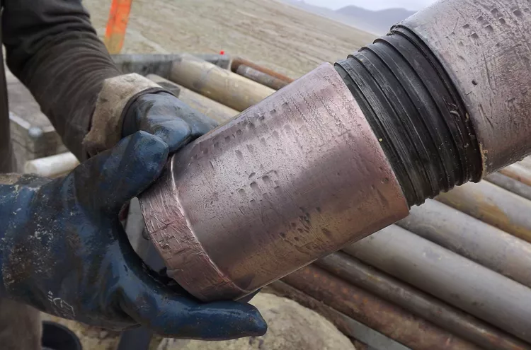 Sonic drill head