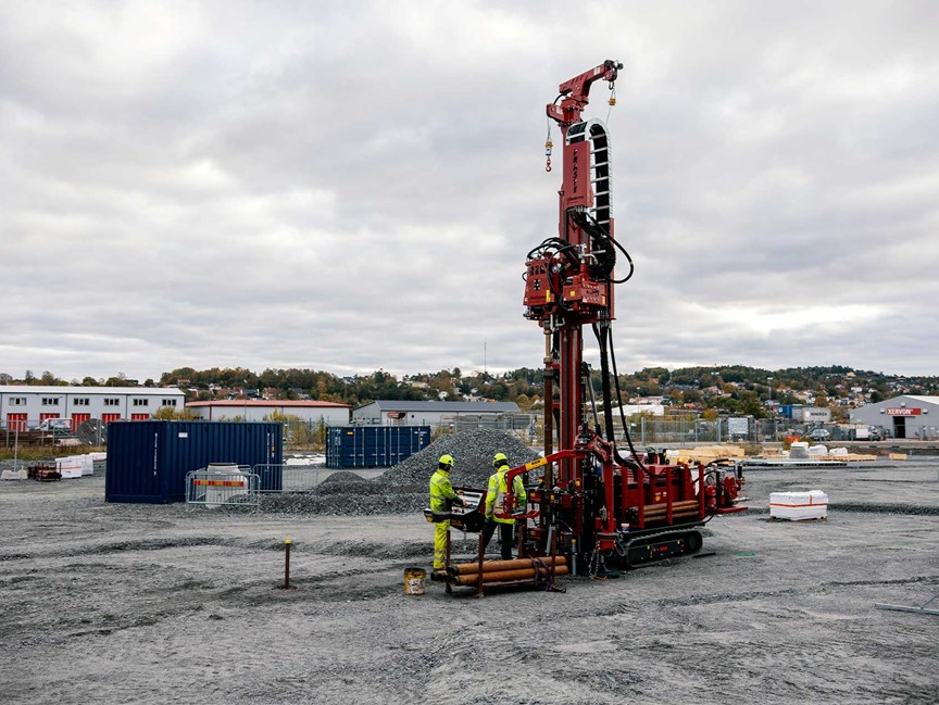 Using a sonic drill rig